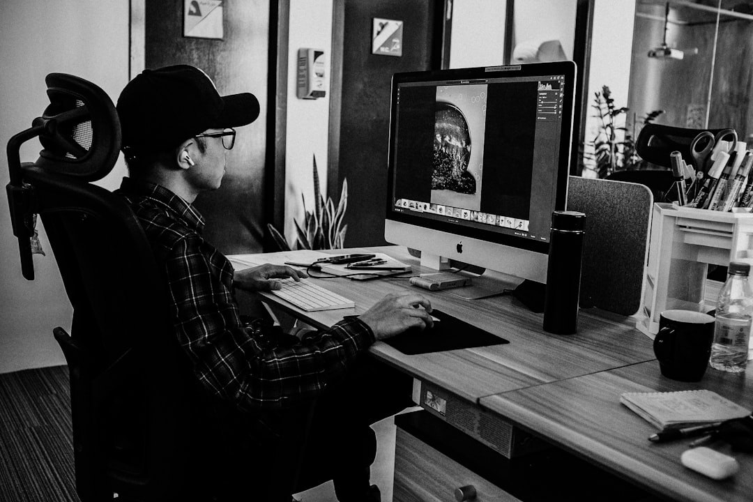 professional video editor at desk